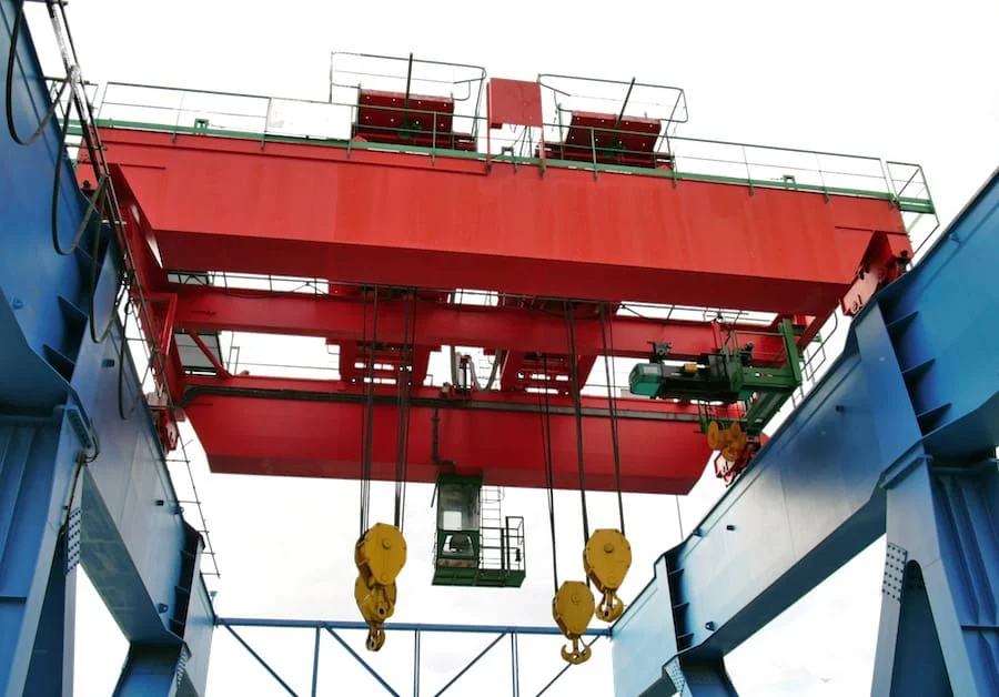 Operate a gantry or overhead crane